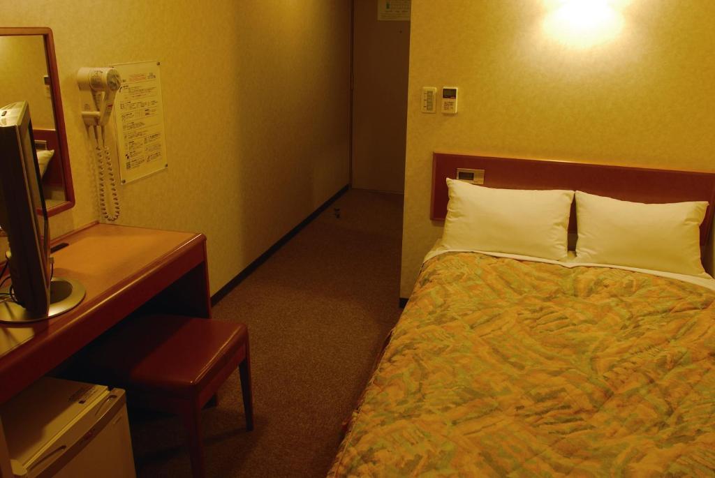 Hotel New Budget Muroran Quarto foto