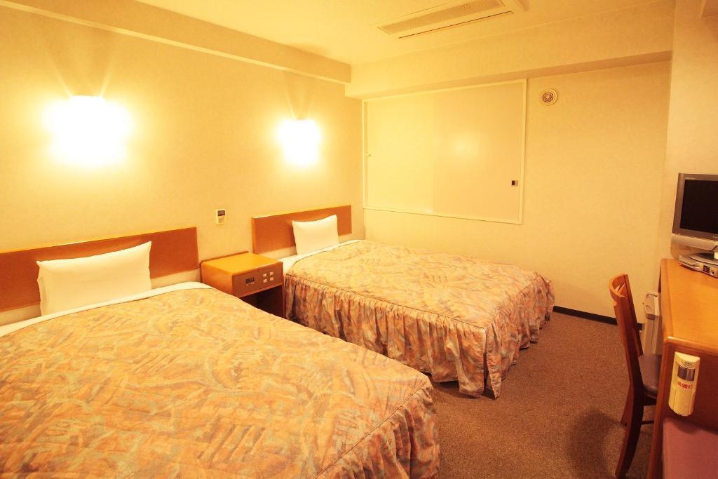 Hotel New Budget Muroran Quarto foto